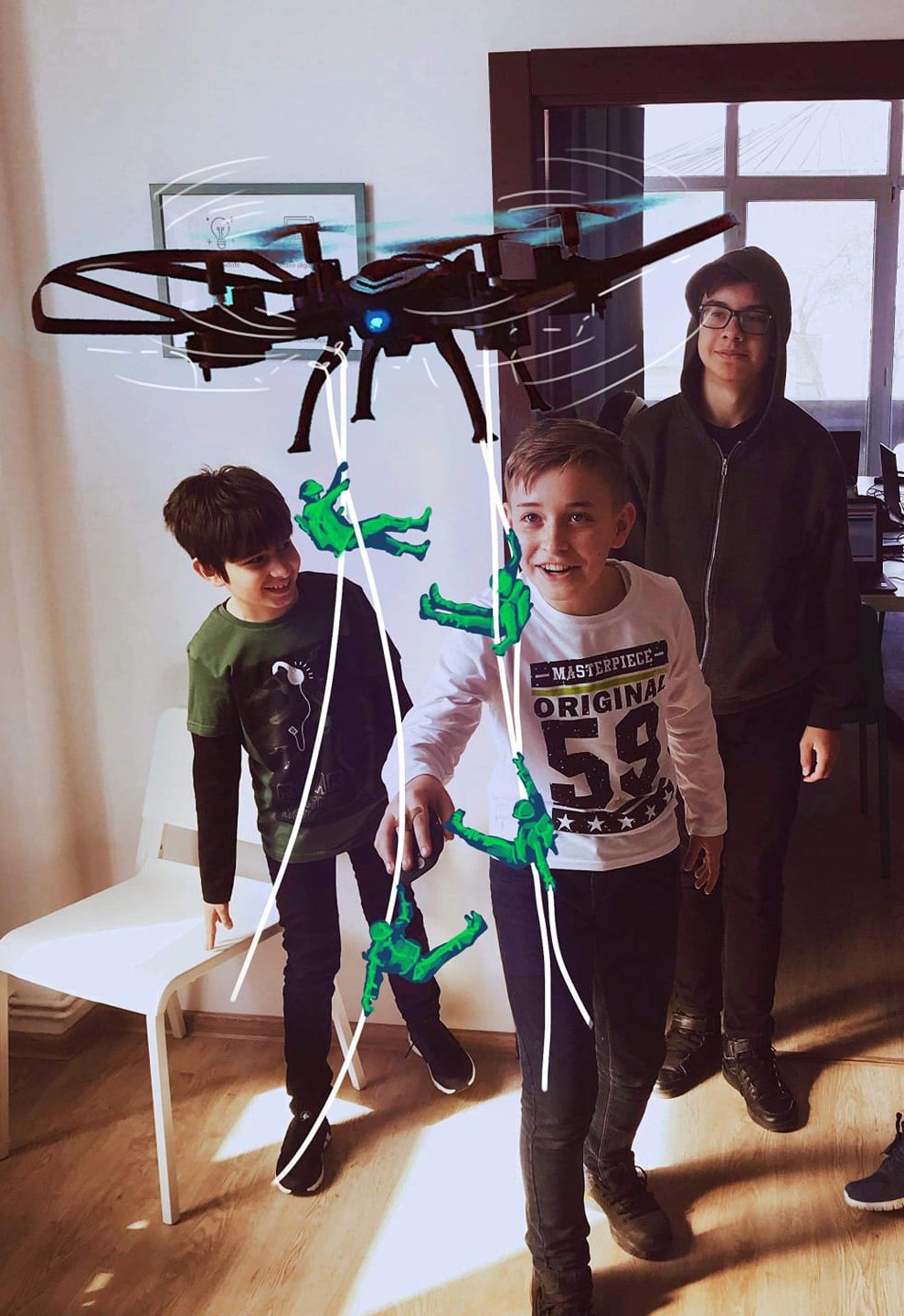 copii controland o drona in cadrul unui curs de robotica